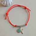 Cord charm bracelet