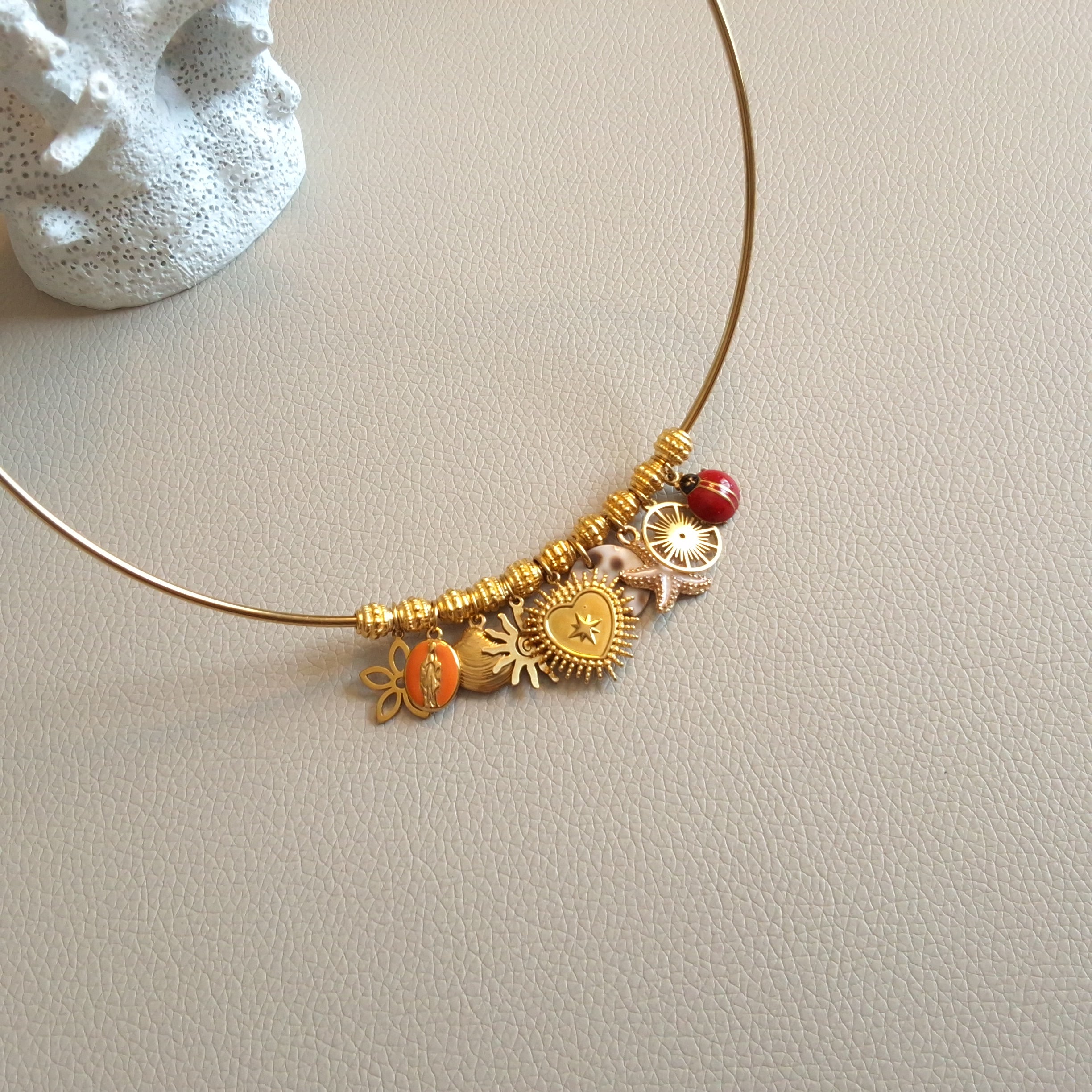 Bangle necklace with charms